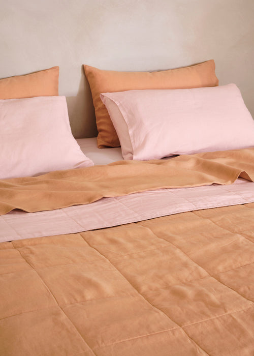Should You Swap Your Duvet for a Quilt This Summer?