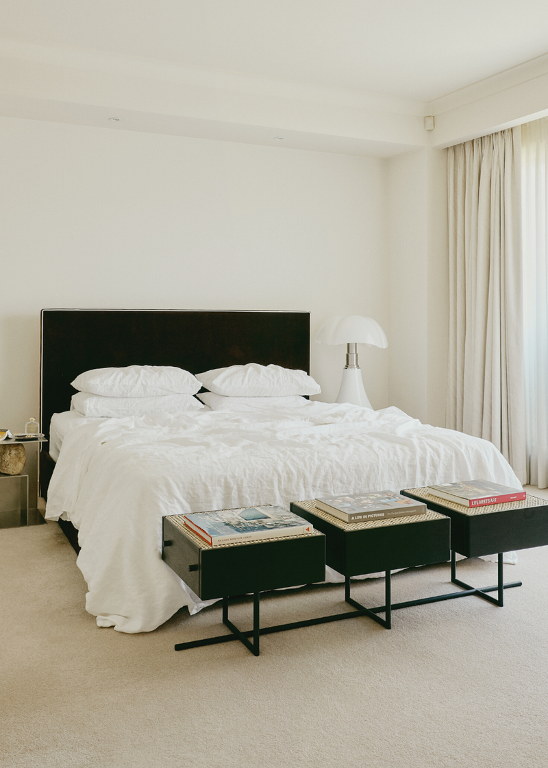 minimalist styled bedroom with linen sheets 