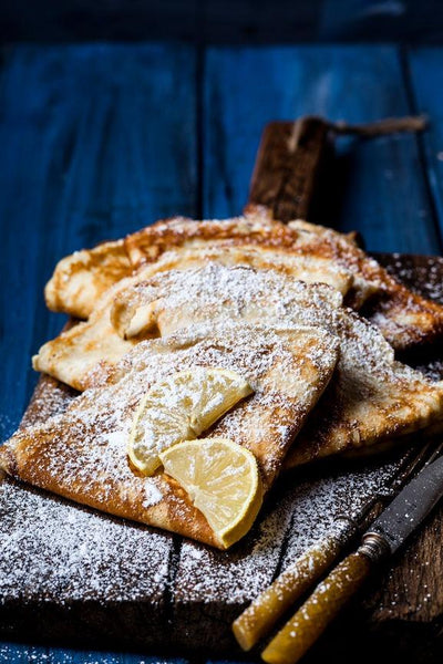 Breakfast in Bed Threads: Traditional French Crepes with Powdered Sugar and Lemon