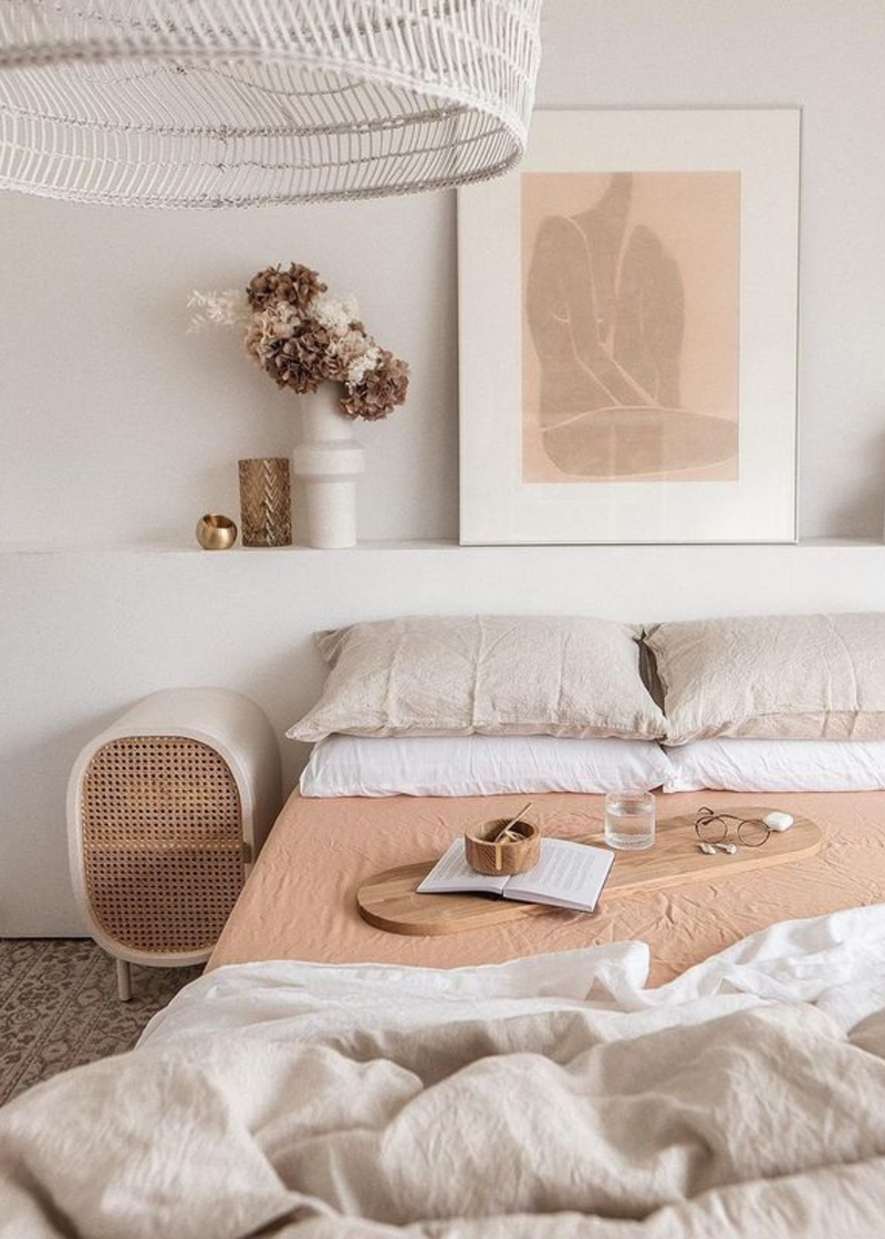 trendy bedroom with oatmeal, white and terracotta linen bed sheets
