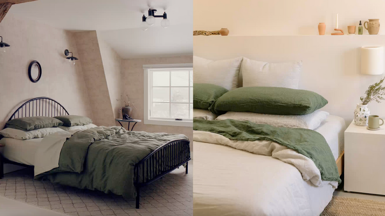 Cozy bedroom with a dark metal bed frame, olive green bedding, and neutral pillows. Near the bed are a candle, a vase with greenery, a mug, and soft natural light from a window.